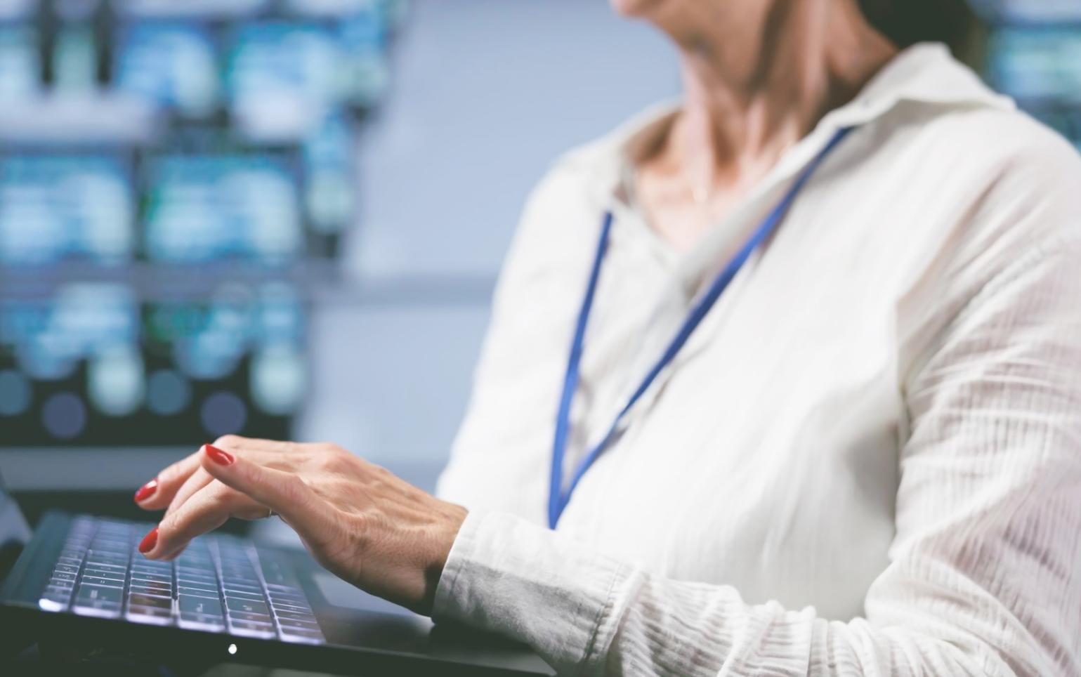 Developer working on blockchain interoperability code